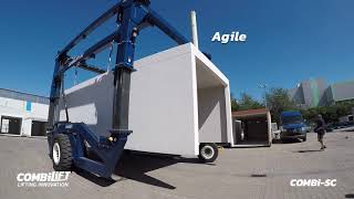 Combilift  COMBiSC  Straddle Carrier lifts Prefabricated Garage [upl. by Paris]