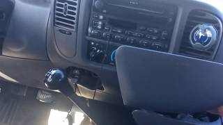 How To Remove a cup holder in a 2001 Ford f150 [upl. by Anelas]