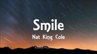 Nat King Cole  Smile Lyrics [upl. by Harlin]