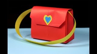 How to make a paper handbag  Easy origami handbag tutorial [upl. by Annunciata213]