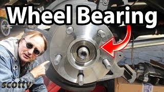 How to Replace a Rear Wheel Bearing in Your Car [upl. by Ennaxor127]