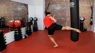 How to Do a Roundhouse Kick  Kickboxing Lessons [upl. by Vaules887]