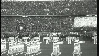 Hitler presides over the opening of the 1936 Olympics while US team member JessHD Stock Footage [upl. by Eldnek]