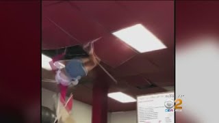 Woman Falls Through Restaurant Ceiling [upl. by Alac]