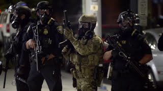 US swoops down on Portland protesters [upl. by Orihakat939]