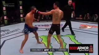 Max Holloway teaching Brian Ortega to block punches mid fight [upl. by Chavaree]