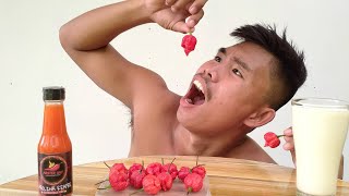 Mukbang 14 Carolina Reapers in 1 Minute World Hottest Chili Breaking the record Boy Tapang 🌶️🔥🥵 [upl. by Nosremaj]