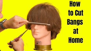 How to Cut Bangs at Home  TheSalonGuy [upl. by Aisela]