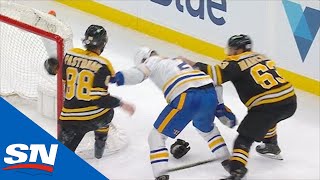 David Pastrnak amp Brad Marchand Team Up On Rasmus Dahlin For Ruthless Cross Check [upl. by Sualk]