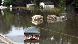 Eerie Coffins Seen Floating Through Flooded Louisiana Streets [upl. by Neala]