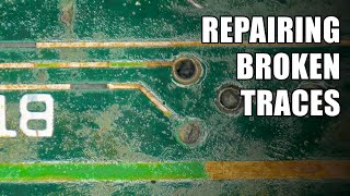 Repairing broken traces on a circuit board [upl. by Sosthina]