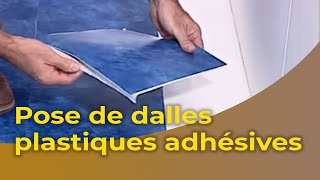 La pose de dalles plastiques adhésives [upl. by Elijah]