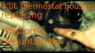 Thermostat housing assembly 2008 Ford Explorer 40L How to change thermostat housing [upl. by Eanahs547]