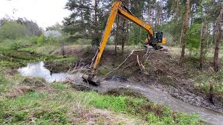 Beaver dam removal with excavator [upl. by Cattier]